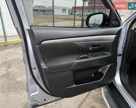 Серый Мицубиси Аутлендер, объемом двигателя 2.36 л и пробегом 198 тыс. км за 13990 $, фото 13 на Automoto.ua