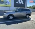 Серый Мицубиси Аутлендер, объемом двигателя 2.36 л и пробегом 225 тыс. км за 12000 $, фото 4 на Automoto.ua