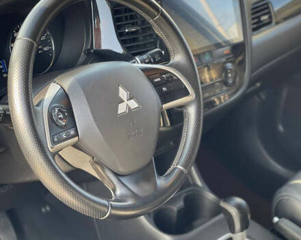 Сірий Міцубісі Аутлендер, об'ємом двигуна 2.4 л та пробігом 209 тис. км за 12200 $, фото 4 на Automoto.ua