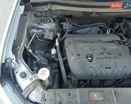 Серый Мицубиси Аутлендер, объемом двигателя 2.4 л и пробегом 197 тыс. км за 14000 $, фото 26 на Automoto.ua