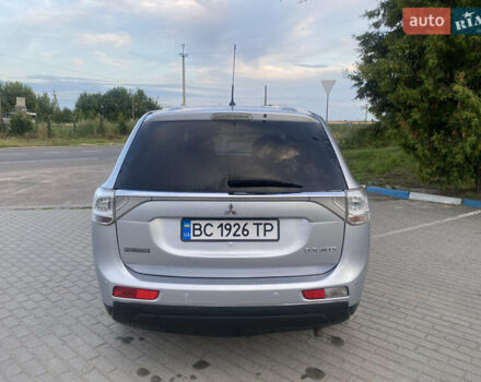 Сірий Міцубісі Аутлендер, об'ємом двигуна 2.36 л та пробігом 310 тис. км за 9500 $, фото 4 на Automoto.ua