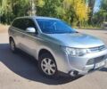 Сірий Міцубісі Аутлендер, об'ємом двигуна 2 л та пробігом 210 тис. км за 11500 $, фото 1 на Automoto.ua