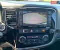 Серый Мицубиси Аутлендер, объемом двигателя 2 л и пробегом 235 тыс. км за 16800 $, фото 28 на Automoto.ua