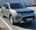 Серый Мицубиси Аутлендер, объемом двигателя 2.36 л и пробегом 225 тыс. км за 12000 $, фото 1 на Automoto.ua