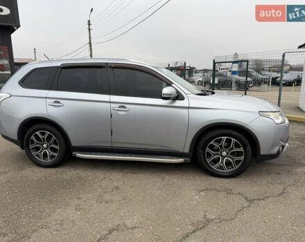 Серый Мицубиси Аутлендер, объемом двигателя 2.36 л и пробегом 198 тыс. км за 13990 $, фото 9 на Automoto.ua