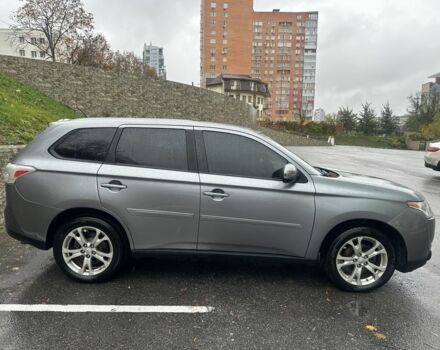 Сірий Міцубісі Аутлендер, об'ємом двигуна 2.4 л та пробігом 219 тис. км за 10800 $, фото 1 на Automoto.ua