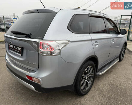 Серый Мицубиси Аутлендер, объемом двигателя 2.36 л и пробегом 198 тыс. км за 13990 $, фото 8 на Automoto.ua