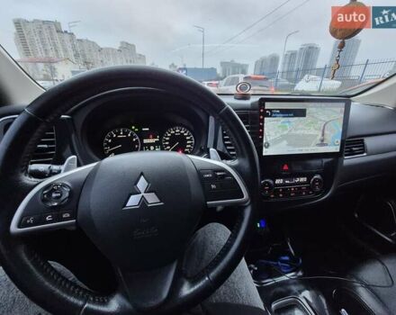 Сірий Міцубісі Аутлендер, об'ємом двигуна 2.36 л та пробігом 182 тис. км за 13600 $, фото 11 на Automoto.ua