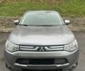 Сірий Міцубісі Аутлендер, об'ємом двигуна 2.4 л та пробігом 219 тис. км за 10800 $, фото 1 на Automoto.ua