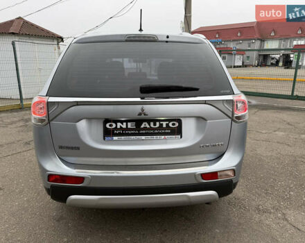 Серый Мицубиси Аутлендер, объемом двигателя 2.36 л и пробегом 198 тыс. км за 13990 $, фото 7 на Automoto.ua