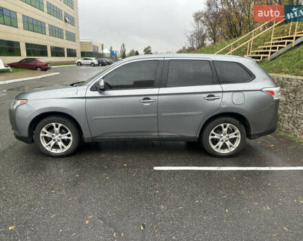 Сірий Міцубісі Аутлендер, об'ємом двигуна 2.4 л та пробігом 219 тис. км за 10800 $, фото 1 на Automoto.ua