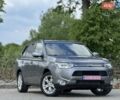 Серый Мицубиси Аутлендер, объемом двигателя 2.2 л и пробегом 173 тыс. км за 15900 $, фото 1 на Automoto.ua