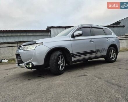 Сірий Міцубісі Аутлендер, об'ємом двигуна 2.36 л та пробігом 182 тис. км за 13600 $, фото 4 на Automoto.ua