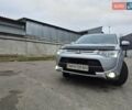 Сірий Міцубісі Аутлендер, об'ємом двигуна 2.36 л та пробігом 182 тис. км за 13600 $, фото 9 на Automoto.ua