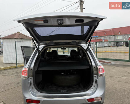 Серый Мицубиси Аутлендер, объемом двигателя 2.36 л и пробегом 198 тыс. км за 13990 $, фото 16 на Automoto.ua