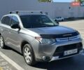 Серый Мицубиси Аутлендер, объемом двигателя 2.36 л и пробегом 225 тыс. км за 12000 $, фото 16 на Automoto.ua