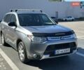 Серый Мицубиси Аутлендер, объемом двигателя 2.36 л и пробегом 225 тыс. км за 12000 $, фото 1 на Automoto.ua