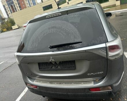 Сірий Міцубісі Аутлендер, об'ємом двигуна 2.4 л та пробігом 219 тис. км за 10800 $, фото 3 на Automoto.ua