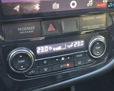 Серый Мицубиси Аутлендер, объемом двигателя 2.36 л и пробегом 164 тыс. км за 17500 $, фото 21 на Automoto.ua