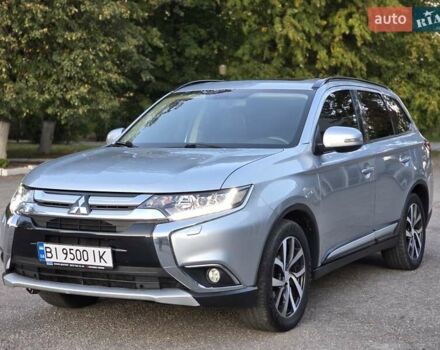 Серый Мицубиси Аутлендер, объемом двигателя 2.36 л и пробегом 164 тыс. км за 17900 $, фото 2 на Automoto.ua