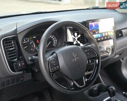 Серый Мицубиси Аутлендер, объемом двигателя 2.36 л и пробегом 164 тыс. км за 17900 $, фото 24 на Automoto.ua