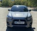 Сірий Міцубісі Аутлендер, об'ємом двигуна 2.4 л та пробігом 145 тис. км за 12700 $, фото 2 на Automoto.ua