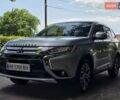 Серый Мицубиси Аутлендер, объемом двигателя 2.38 л и пробегом 153 тыс. км за 14800 $, фото 1 на Automoto.ua