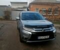 Сірий Міцубісі Аутлендер, об'ємом двигуна 2.4 л та пробігом 226 тис. км за 13500 $, фото 1 на Automoto.ua