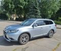 Серый Мицубиси Аутлендер, объемом двигателя 2.4 л и пробегом 160 тыс. км за 14200 $, фото 1 на Automoto.ua