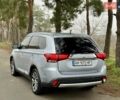 Серый Мицубиси Аутлендер, объемом двигателя 2.2 л и пробегом 180 тыс. км за 16499 $, фото 3 на Automoto.ua