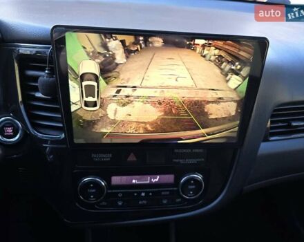 Серый Мицубиси Аутлендер, объемом двигателя 2.36 л и пробегом 164 тыс. км за 17500 $, фото 22 на Automoto.ua