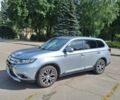 Серый Мицубиси Аутлендер, объемом двигателя 2.4 л и пробегом 160 тыс. км за 14200 $, фото 1 на Automoto.ua