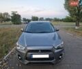 Серый Мицубиси Аутлендер, объемом двигателя 2 л и пробегом 160 тыс. км за 13000 $, фото 1 на Automoto.ua