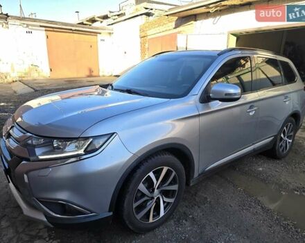 Серый Мицубиси Аутлендер, объемом двигателя 2.36 л и пробегом 164 тыс. км за 17500 $, фото 1 на Automoto.ua