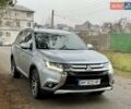 Серый Мицубиси Аутлендер, объемом двигателя 2.2 л и пробегом 180 тыс. км за 16499 $, фото 2 на Automoto.ua