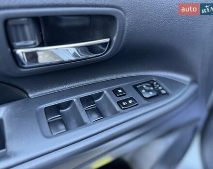 Серый Мицубиси Аутлендер, объемом двигателя 2 л и пробегом 200 тыс. км за 13999 $, фото 32 на Automoto.ua