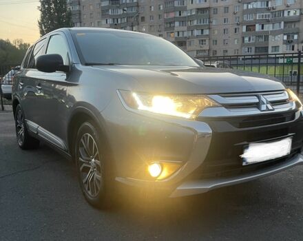 Серый Мицубиси Аутлендер, объемом двигателя 2.4 л и пробегом 225 тыс. км за 12000 $, фото 1 на Automoto.ua
