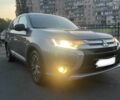 Серый Мицубиси Аутлендер, объемом двигателя 2.4 л и пробегом 225 тыс. км за 12000 $, фото 1 на Automoto.ua