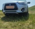 Серый Мицубиси Аутлендер, объемом двигателя 2.4 л и пробегом 132 тыс. км за 12300 $, фото 3 на Automoto.ua