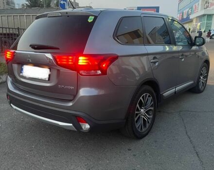 Серый Мицубиси Аутлендер, объемом двигателя 2.4 л и пробегом 225 тыс. км за 12000 $, фото 3 на Automoto.ua