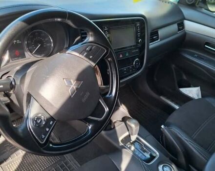 Серый Мицубиси Аутлендер, объемом двигателя 2.4 л и пробегом 160 тыс. км за 14200 $, фото 4 на Automoto.ua