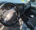 Серый Мицубиси Аутлендер, объемом двигателя 2.4 л и пробегом 160 тыс. км за 14200 $, фото 4 на Automoto.ua