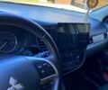 Серый Мицубиси Аутлендер, объемом двигателя 2.4 л и пробегом 250 тыс. км за 13300 $, фото 5 на Automoto.ua