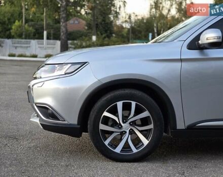 Серый Мицубиси Аутлендер, объемом двигателя 2.36 л и пробегом 164 тыс. км за 17900 $, фото 6 на Automoto.ua