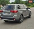 Серый Мицубиси Аутлендер, объемом двигателя 2.36 л и пробегом 210 тыс. км за 13500 $, фото 12 на Automoto.ua