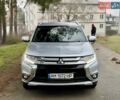 Серый Мицубиси Аутлендер, объемом двигателя 2.2 л и пробегом 180 тыс. км за 16499 $, фото 1 на Automoto.ua