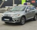 Серый Мицубиси Аутлендер, объемом двигателя 2.36 л и пробегом 210 тыс. км за 13500 $, фото 17 на Automoto.ua