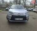 Серый Мицубиси Аутлендер, объемом двигателя 2.4 л и пробегом 107 тыс. км за 15300 $, фото 1 на Automoto.ua