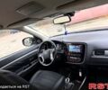 Серый Мицубиси Аутлендер, объемом двигателя 2 л и пробегом 270 тыс. км за 17390 $, фото 2 на Automoto.ua