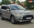 Серый Мицубиси Аутлендер, объемом двигателя 2.36 л и пробегом 210 тыс. км за 13500 $, фото 1 на Automoto.ua